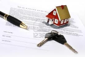 real estate contract with keys and house